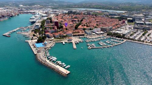 an aerial view of a harbor with boats in the water at Santoria Casa in Koper