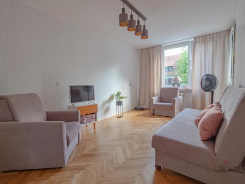 Posedenie v ubytovaní Apartament nad Małym Jeziorakiem