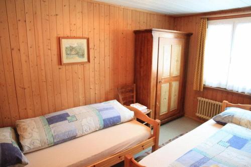 Postel nebo postele na pokoji v ubytování Hotel Guidon Apartments