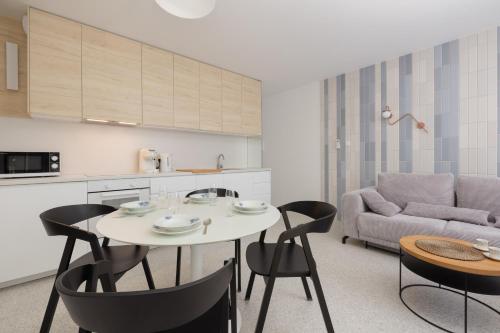 Η κουζίνα ή μικρή κουζίνα στο Porta Mare Apartamenty Słoneczne Tarasy