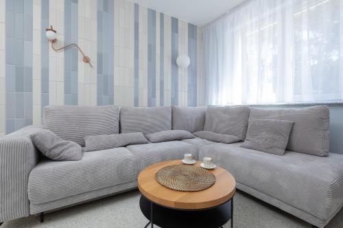 Χώρος καθιστικού στο Porta Mare Apartamenty Słoneczne Tarasy