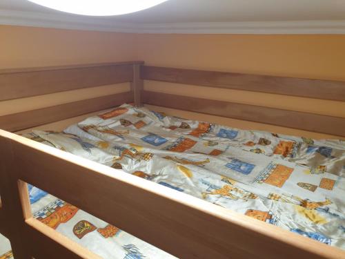 Posteľ alebo postele v izbe v ubytovaní Apartmani Kolibri