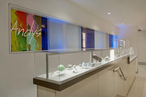 a bathroom with a counter with glass items on it at Fairmont Pittsburgh in Pittsburgh