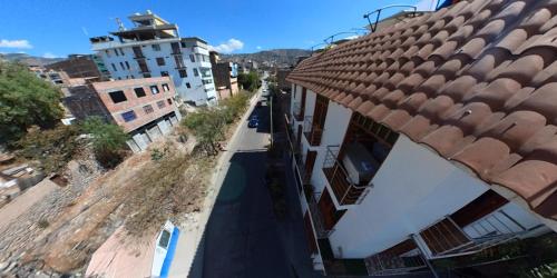 an overhead view of a city street with buildings at Sumaq Wari Hotel in Ayacucho