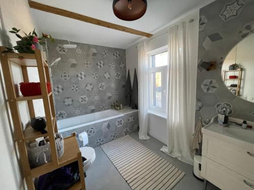 Ванная комната в Family holiday house near to Baltic sea in Pitrags "JAUNZUMBRI"