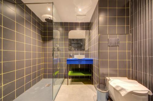 Vonios kambarys apgyvendinimo įstaigoje IKYK Hotel- IK Collection
