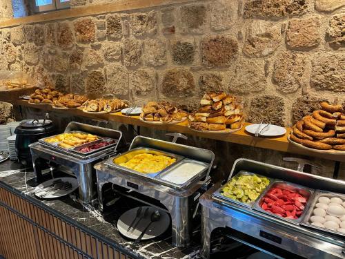 a buffet line with many different types of food at Puding Hotel in Antalya