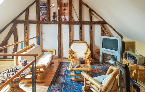 a living room filled with furniture and a tv at Stunning Home In Ardentes With Kitchen in Ardentes