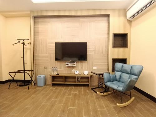怡然自得-智能主題民宿にあるテレビまたはエンターテインメントセンター