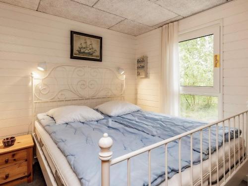 Posteľ alebo postele v izbe v ubytovaní Holiday home Læsø LIII
