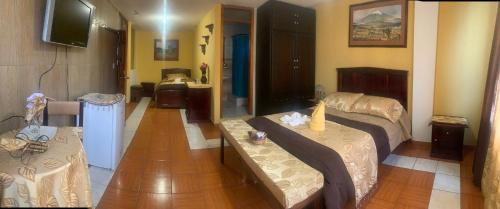 Hostal Jora Continentalにあるベッド
