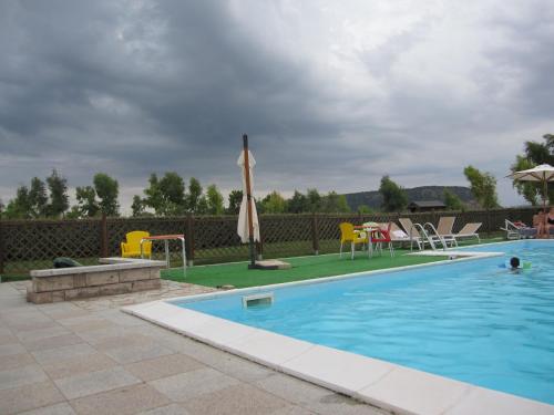The swimming pool at or close to Vistalago Garden Doria