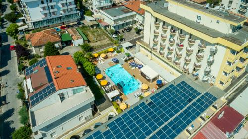 an overhead view of a building with a swimming pool at Hotel Montmartre in Rimini
