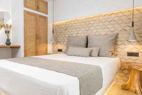 Ένα ή περισσότερα κρεβάτια σε δωμάτιο στο Naxian Icon Luxury Residence 3