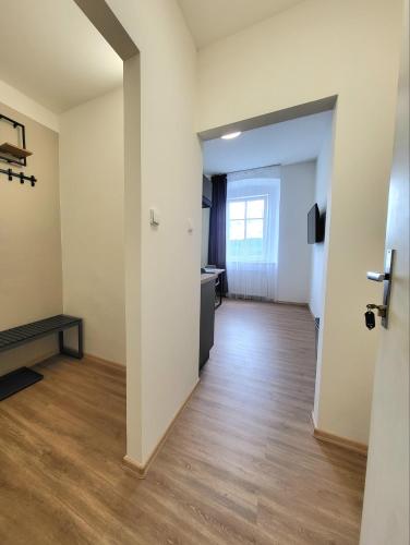 Ein Bett oder Betten in einem Zimmer der Unterkunft Apartmány hotelu Ostrý