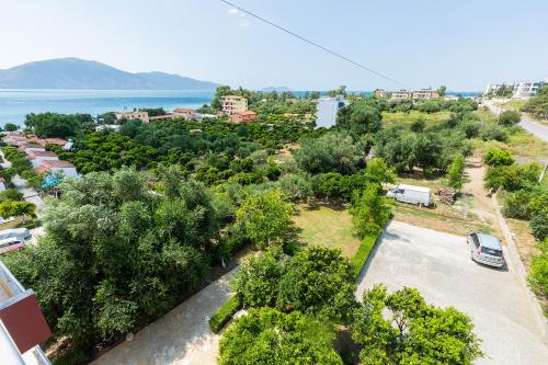 an aerial view of a city with a parking lot at Hotel Dini in Vlorë