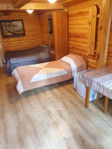 Кровать или кровати в номере Гостевой дом Azia