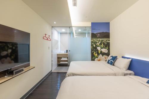 TV a/nebo společenská místnost v ubytování CU Hotel Taipei