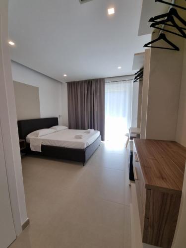 Katil atau katil-katil dalam bilik di Marea Retreat Rooms