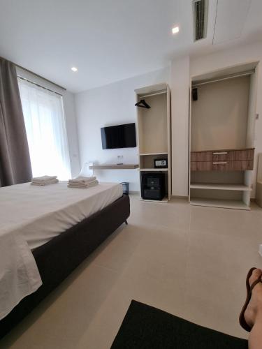 Katil atau katil-katil dalam bilik di Marea Retreat Rooms