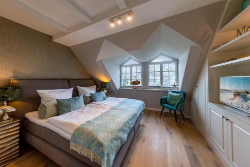 Säng eller sängar i ett rum på Haus Sylter Inselglück