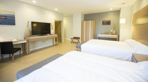 Hotel Royal Oasisにあるベッド