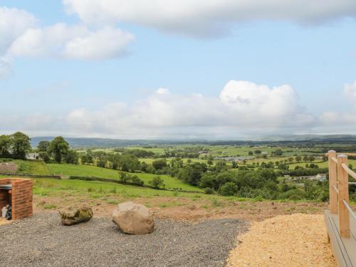 a view of the countryside from the top of a hill at Laird Lodge 3 in Lockerbie