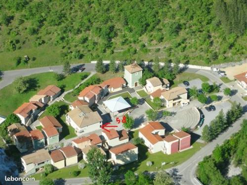 an aerial view of a house in a mountain at DIGNE LES BAINS in Digne-les-Bains