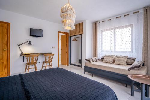 Кровать или кровати в номере Hotel Los Narejos