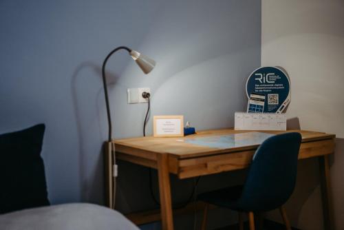 Katil atau katil-katil dalam bilik di Haus LUNA - Privatzimmer im sonnigen Südburgenland