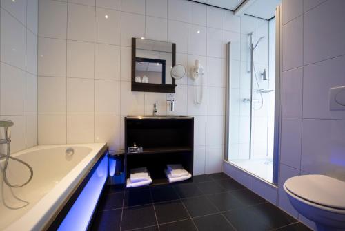 Fletcher Wellness-Hotel Brabant-Millにあるバスルーム