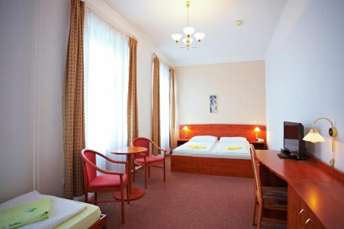 Wellness Hotel Centralにあるベッド