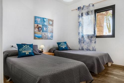 Posteľ alebo postele v izbe v ubytovaní Apartamento Zaida