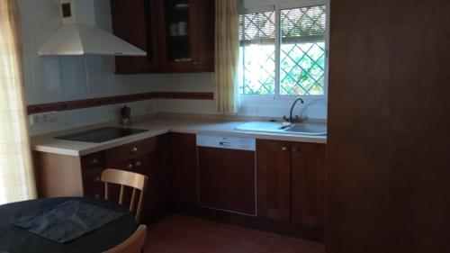 Η κουζίνα ή μικρή κουζίνα στο Habitaciones Jacaranda
