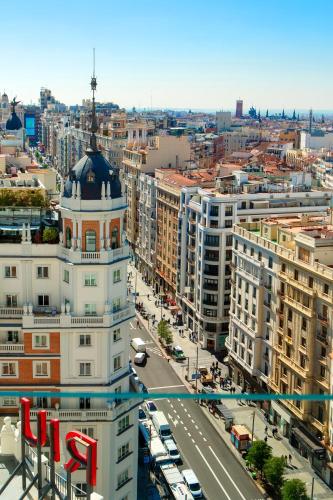 an aerial view of a city with buildings at Riu Plaza España in Madrid
