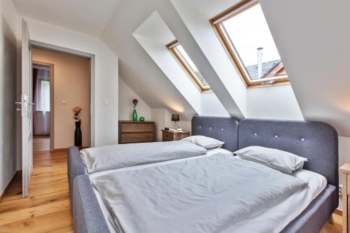 Posteľ alebo postele v izbe v ubytovaní Zaži Apartmány Mýto pod Ďumbierom