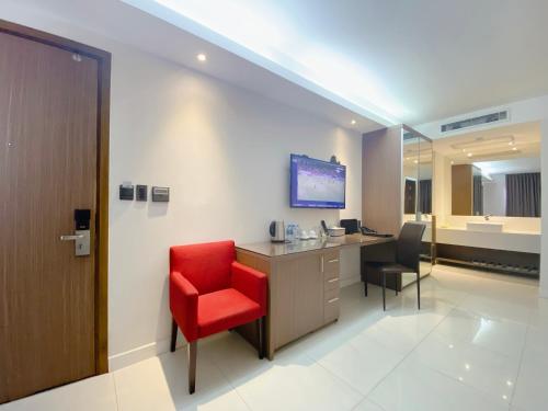 TV a/nebo společenská místnost v ubytování The Luxe Hotel