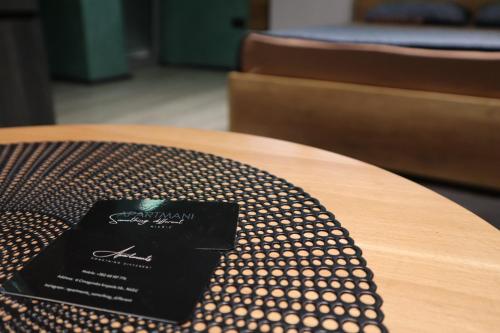 a wooden table with a sign on top of it at Something Different in Nikšić