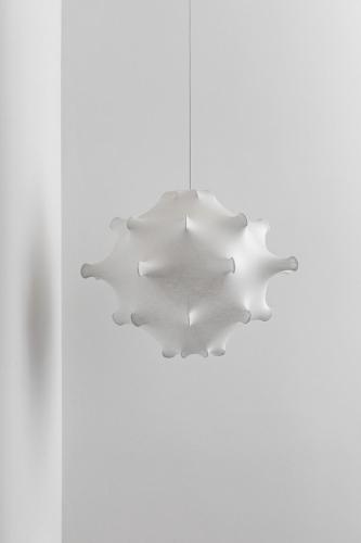 a white ceiling light hanging from a white wall at Giardino Dei Pini - Boutique Hotel in Alliste