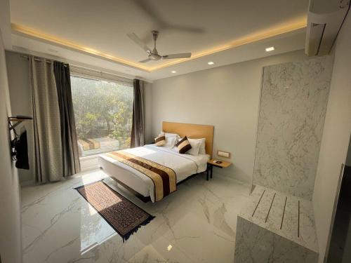 Voodi või voodid majutusasutuse The Empire Villa,Cyber City, Gurgaon toas