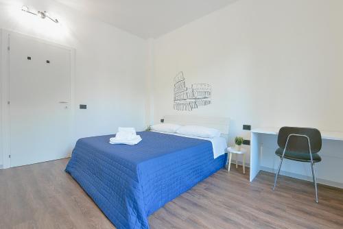 Кровать или кровати в номере Alle Porte Del Centro - Guest House - Reggio Emilia - Ingresso Centro Storico - Parcheggio Gratuito