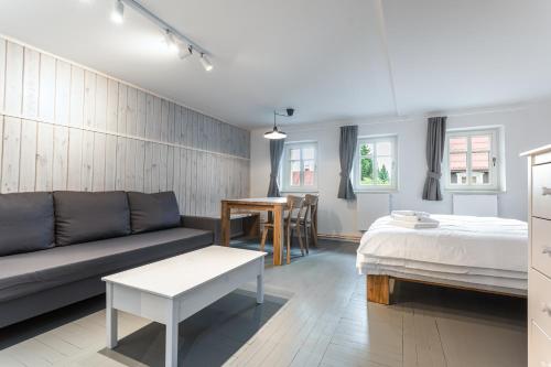 Postel nebo postele na pokoji v ubytování Apartmány VOLF - Boží Dar