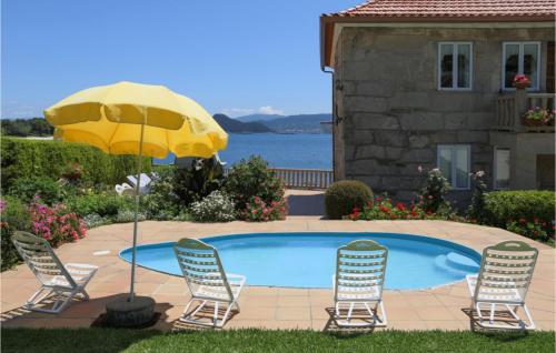 The swimming pool at or close to Nice Home In Raxo With Wifi