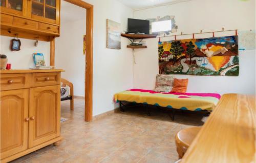 A television and/or entertainment centre at 1 Bedroom Nice Home In Vallehermoso