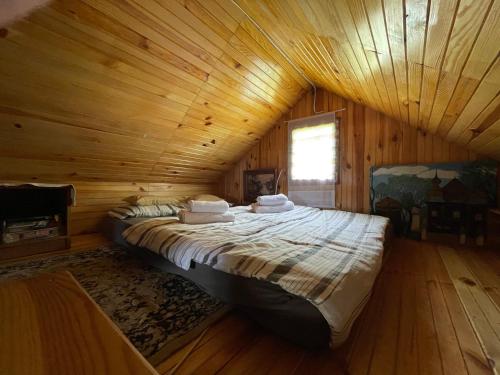 Кровать или кровати в номере Wittówka - domek na wyłączność z dala od sąsiadów