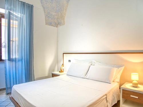 Ein Bett oder Betten in einem Zimmer der Unterkunft Ideal Rooms