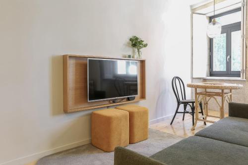 TV o dispositivi per l'intrattenimento presso ORM Carregal Apartment