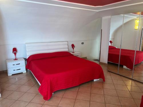 Ένα ή περισσότερα κρεβάτια σε δωμάτιο στο Villa Bebe'