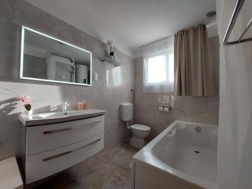 Kupatilo u objektu Guesthouse Adria