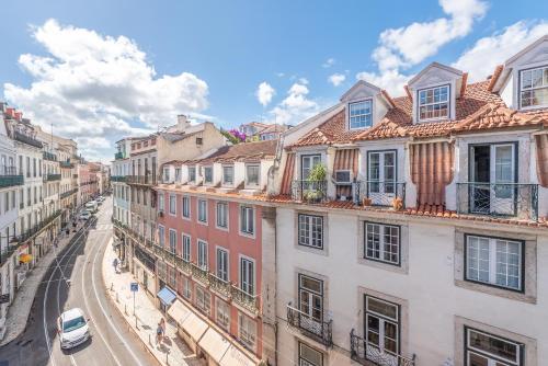 a view of a city street with buildings at Happy at Chiado in Lisbon